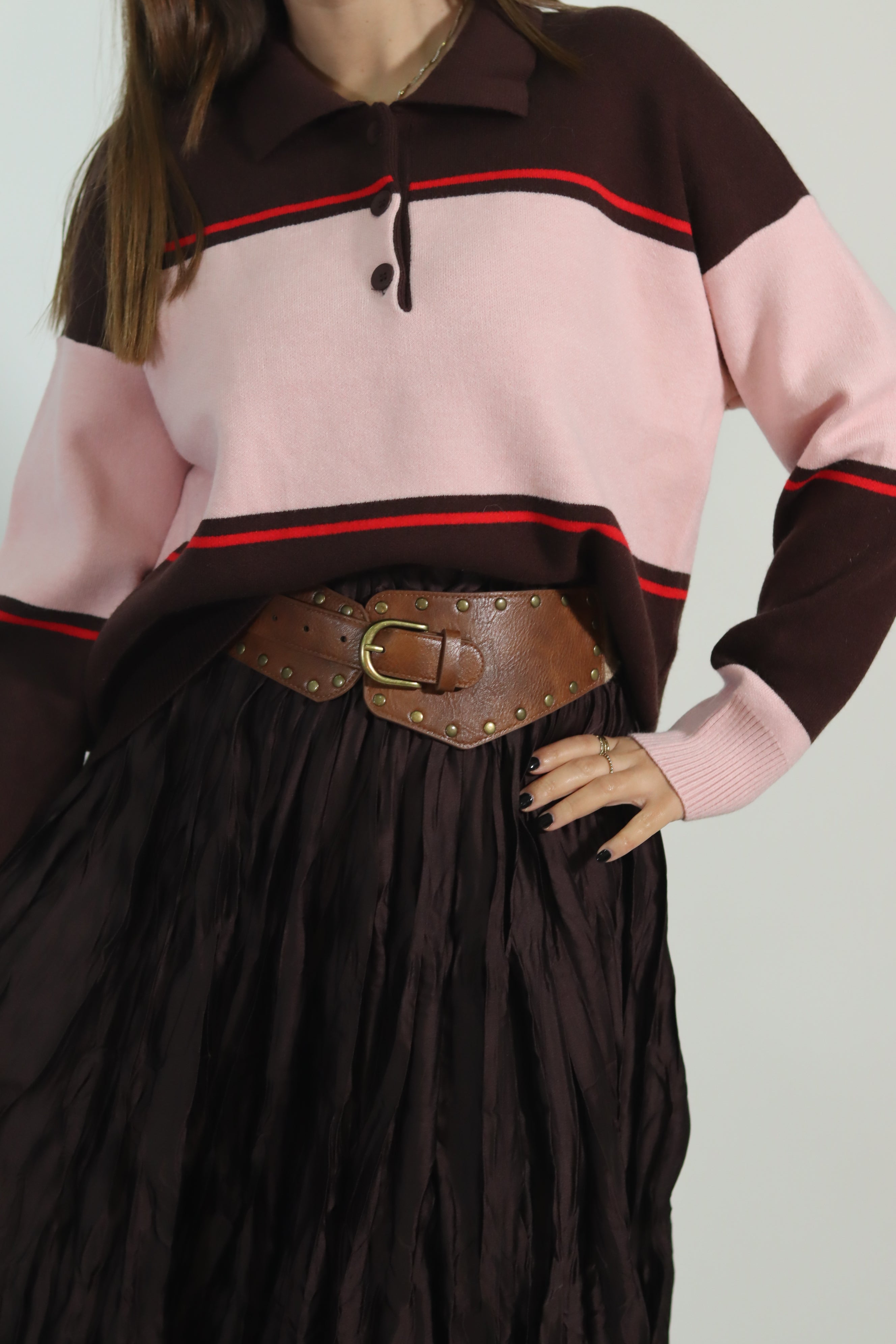 Polo rosa e castanho