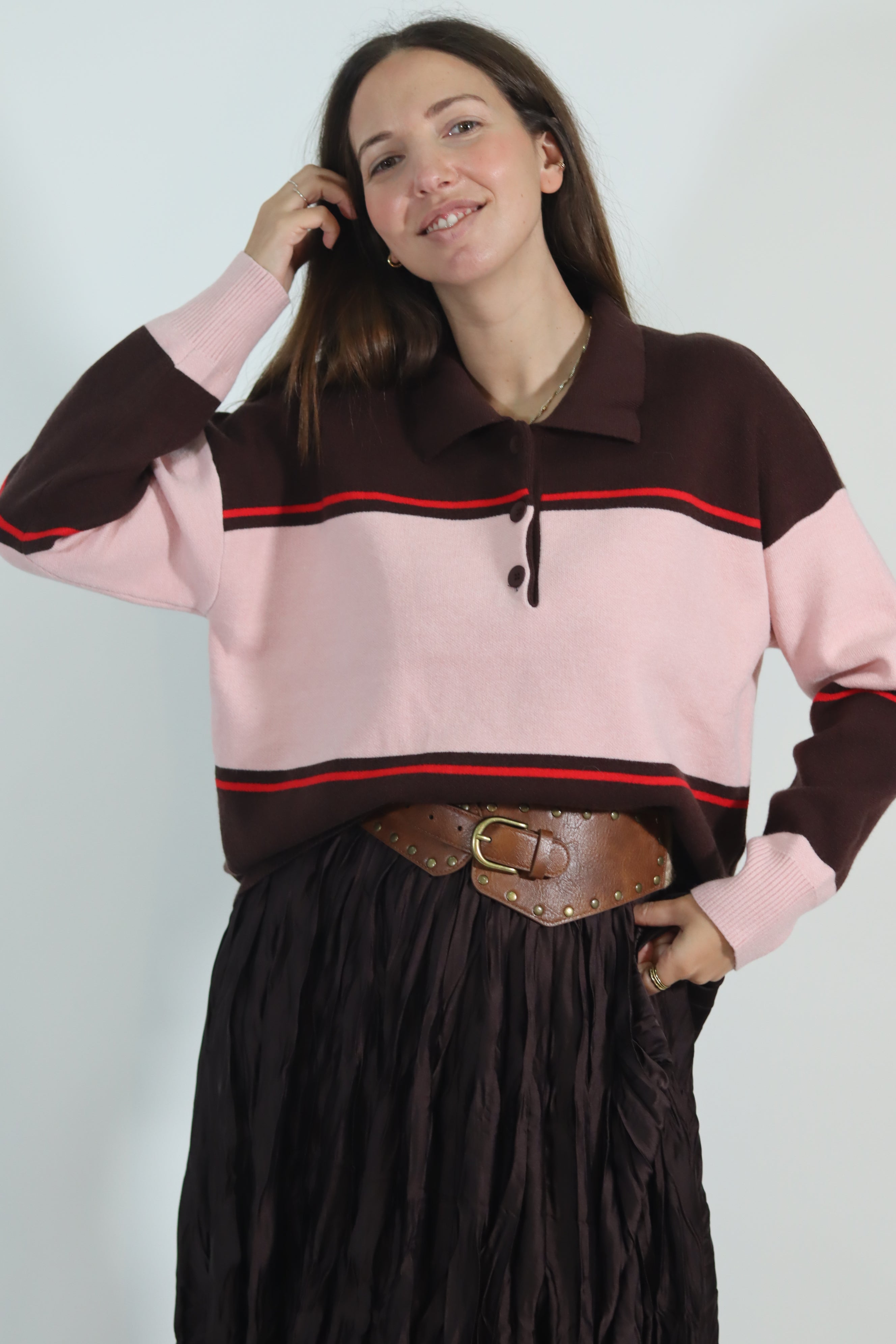 Polo rosa e castanho